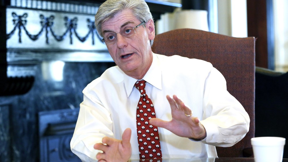 Mississippi Gov. Phil Bryant speaks during an exclusive pre-legislative session interview with The Associated Press at his office in the Capitol in Jackson, Mississippi, December 18, 2013.
