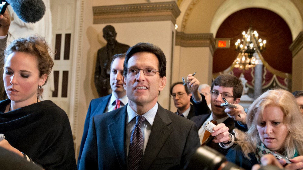 House Majority Leader Eric Cantor of Va. walks to the House chamber on Capitol Hill in Washington, Friday, October 11, 2013.
