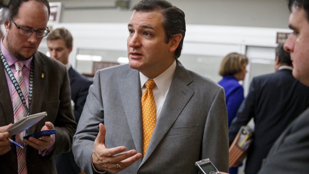 Sen. Ted Cruz, R-Texas speaks with reporters on Capitol Hill in Washington, Tuesday, Dec. 17, 2013.