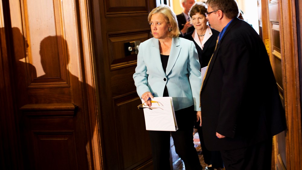 Sen. Mary Landrieu arrives for a news conference on Capitol Hill in Washington, Oct. 3, 2013.