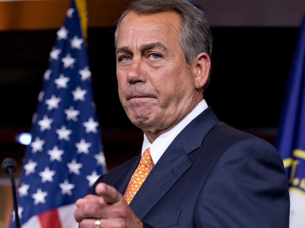 Speaker John Boehner gestures as he speaks to reporters, on Capitol Hill in Washington. (AP Photo/J. Scott Applewhite)