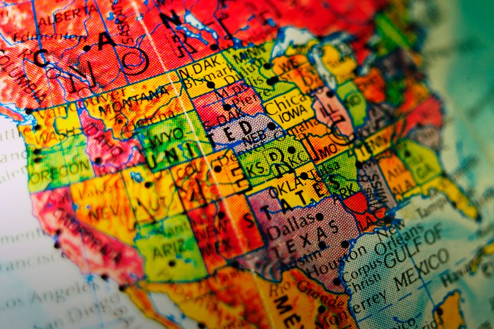 North America is pictured on a globe. (Photo by Don Carstens/68/Ocean/Corbis)