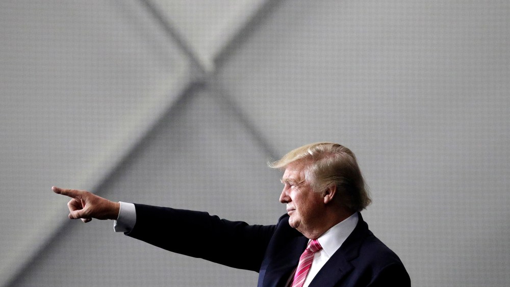 Republican presidential candidate Donald Trump motions to the crowd after speaking at a rally, Oct. 1, 2016, in Manheim, Pa. (Photo by John Locher/AP)