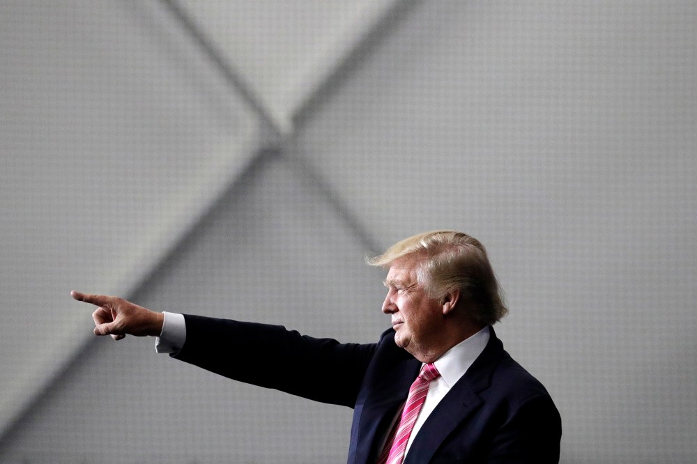 Republican presidential candidate Donald Trump motions to the crowd after speaking at a rally, Oct. 1, 2016, in Manheim, Pa. (Photo by John Locher/AP)