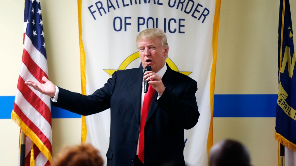 Republican presidential candidate Donald Trump speaks to retired and active law enforcement personnel at a Fraternal Order of Police lodge during a campaign stop in Statesville, N.C. on Aug. 18, 2016. (Photo by Gerald Herbert/AP)