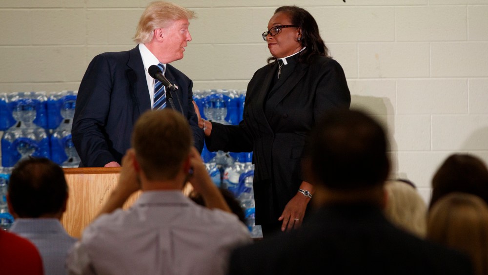 Rev. Faith Green Timmons interrupts Republican presidential candidate Donald Trump as he spoke during a visit to Bethel United Methodist Church, Sept. 14, 2016, in Flint, Mich. (Photo by Evan Vucci/AP)
