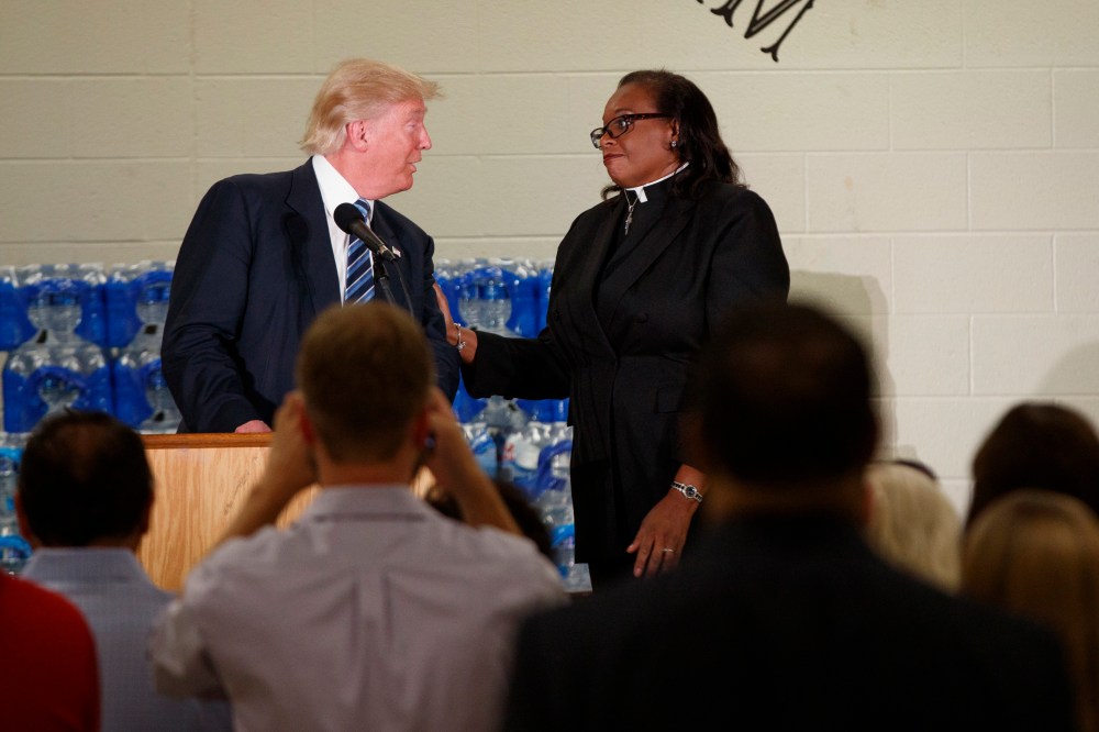 Rev. Faith Green Timmons interrupts Republican presidential candidate Donald Trump as he spoke during a visit to Bethel United Methodist Church, Sept. 14, 2016, in Flint, Mich. (Photo by Evan Vucci/AP)