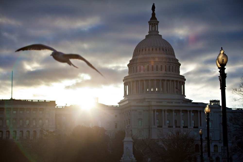 FILE  In this March 7, 2013, file photo the sun breaks through clouds over the U.S. Capitol in Washington. Daylight-saving time begins at 2 a.m. Sunday, March 10, 2013, when clocks officially move ahead an hour. (AP Photo/J. Scott Applewhite, File)
