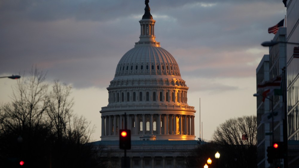 The dome of the U.S. Capitol Building is seen as the sun sets on Capitol Hill in Washington, Thursday, March 7, 2013. (AP Photo/Charles Dharapak)