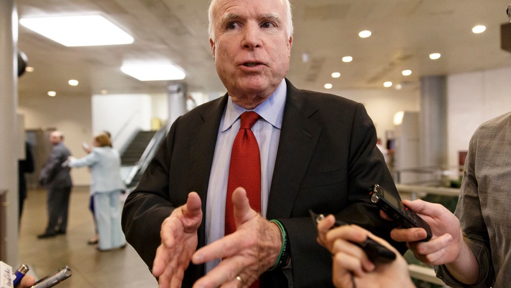 Sen. John McCain, R-Ariz., speaks to reporters at the Capitol in Washington, Wednesday, June 4, 2014.