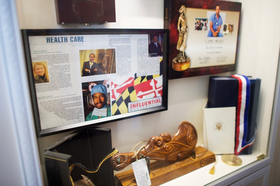 A display case with memorabilia is pictured in Dr. Benjamin Carson's residence in Upperco, Md. on Nov. 27, 2014. (Photo by Mark Makela)