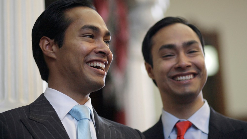 Julian Castro, left, mayor-elect of San Antonio, pauses during a visit with his brother, Rep. Joaquin Castro, D-San Antonio, right, in the Texas House of Representatives Wednesday, May 27, 2009, in Austin, Texas.  (AP Photo/Harry Cabluck)