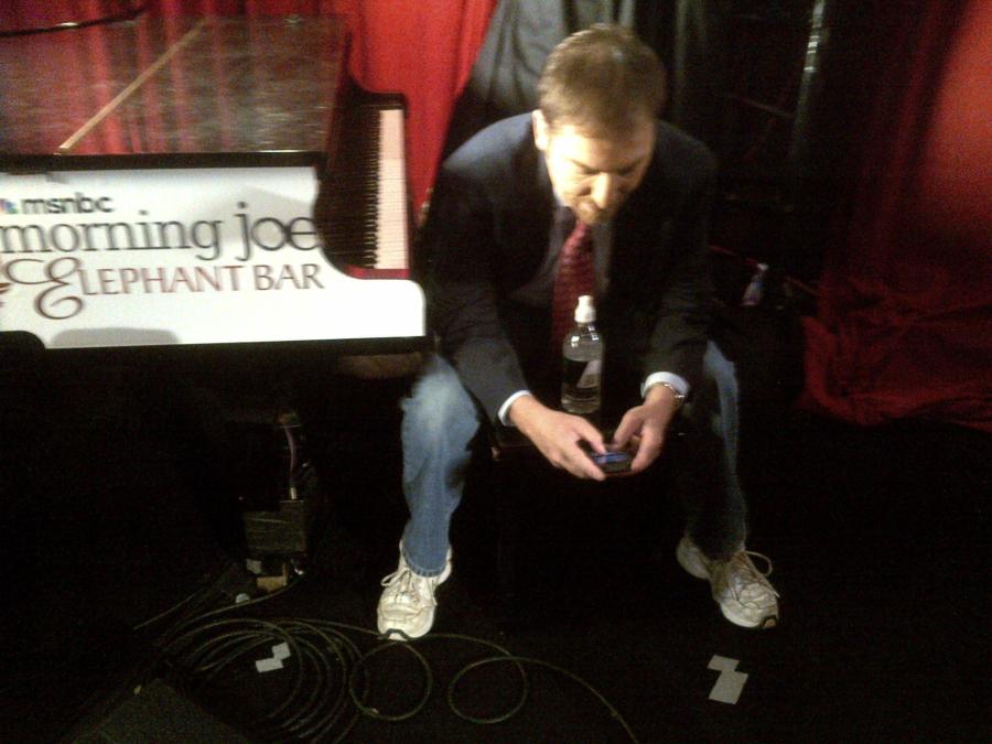 Chuck tickles the ivories... or at least the BlackBerry keys on our last day at Howl at the Moon.