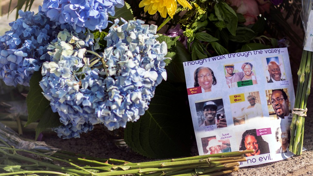 Flowers and notes of hope and support from the community line the sidewalk, June 19, 2015 in front of the Emanuel AME Church in Charleston, S.C. (Photo by Stephen B. Morton/AP)