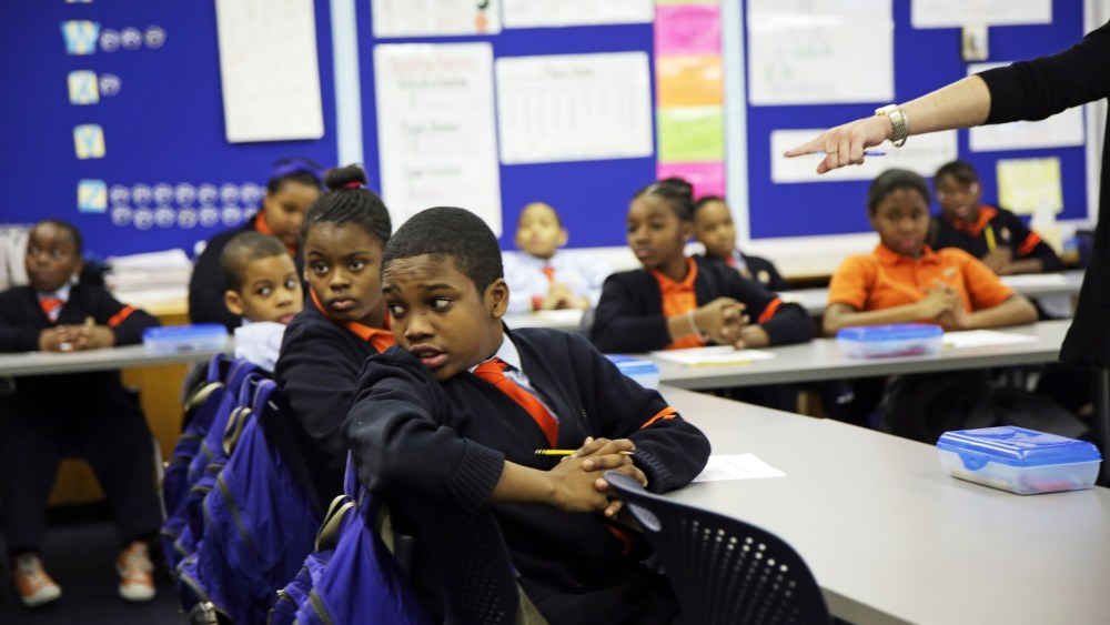 Six graders attend a math class at Success Academy Middle School in Harlem Monday, March 3, 2014.