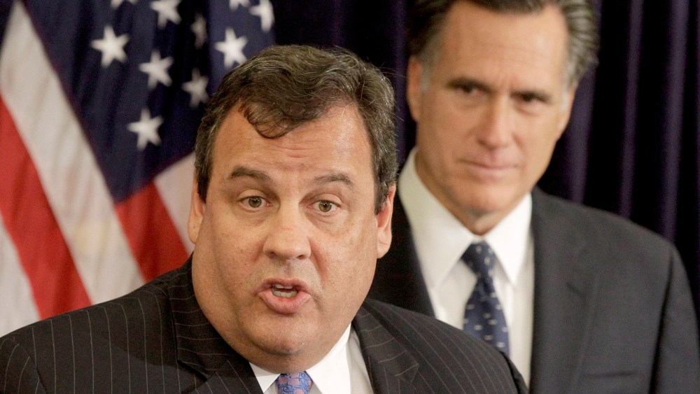 New Jersey Gov. Chris Christie, left, endorses Republican presidential candidate, former Massachusetts Gov. Mitt Romney, right, Tuesday, Oct. 11, 2011, during a news conference in Lebanon, N.H.  (AP Photo/Stephan Savoia)
