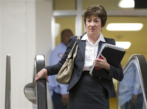 Sen. Susan Collins, R-Maine, ranking Republican on the Senate Homeland Security and Governmental Affairs Committee walks to a meeting on Capitol Hill in Washington, Wednesday, Nov. 28, 2012, for a meeting with UN Ambassador Susan Rice. Rice continued...