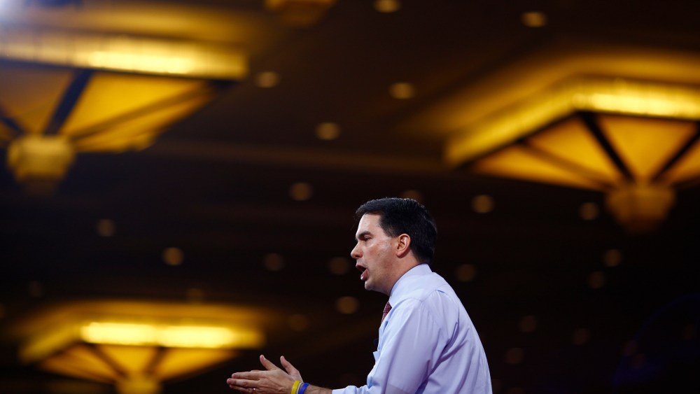 Dropping hints of a 2016 presidential run, Wisconsin Governor Scott Walker speaks at CPAC in National Harbor, Md., on Feb., 26, 2015.