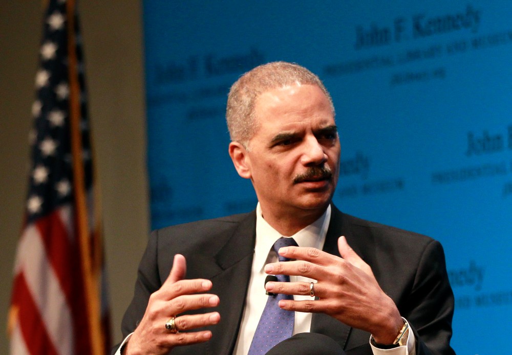 U.S. Attorney General Eric Holde responds to a question during a forum at the JFK Kennedy Library and Museum, in Boston, Tuesday, Dec. 11, 2012 (Photo by Steven Senne/AP)