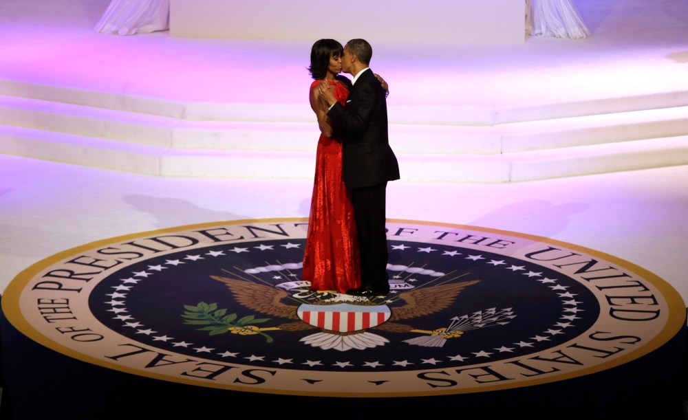 President Barack Obama and first lady Michelle Obama kiss as they dance during the Commander-In-Chief inaugural ball at the Washington Convention Center during the 57th Presidential Inauguration on Monday, Jan. 21, 2013 in Washington.  (Photo by  Evan...