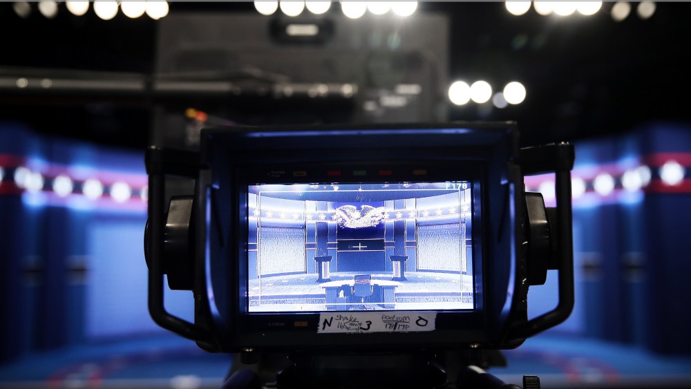 The stage is displayed on a television monitor prior to the start of the third U.S. presidential debate at the Thomas & Mack Center on Oct. 19, 2016 in Las Vegas, Nev. (Photo by Drew Angerer/Getty)