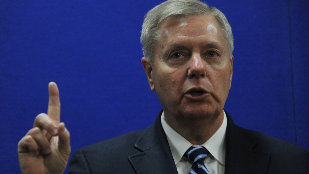 Senator Lindsey Graham speaks as he takes part in a press conference at the U.S. Embassy in Kabul on January 2, 2014.