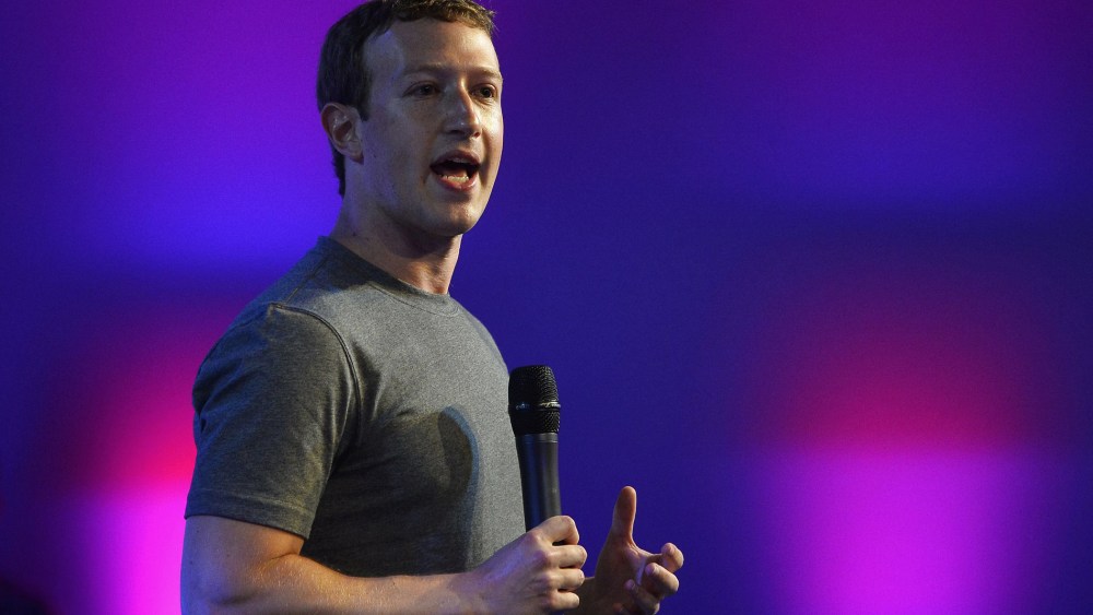 US chairman and chief executive of Facebook Mark Zuckerberg gestures as he announces the Internet.org Innovation Challenge in India in New Delhi on Oct. 9, 2014.