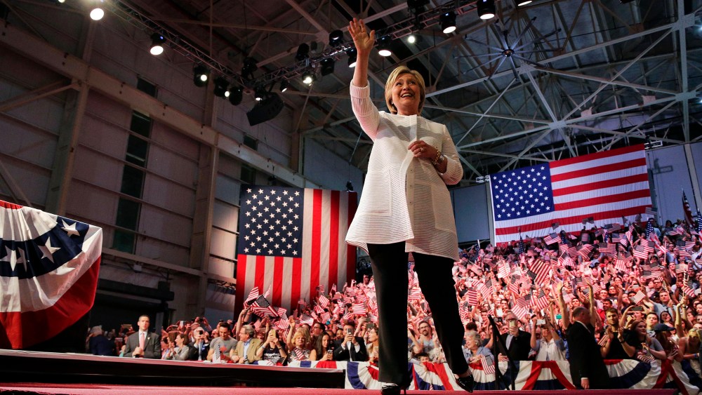 Democratic presidential candidate Hillary Clinton waves to supporters during a presidential primary election night rally, June 7, 2016, in New York. (Photo by Julie Jacobson/AP)