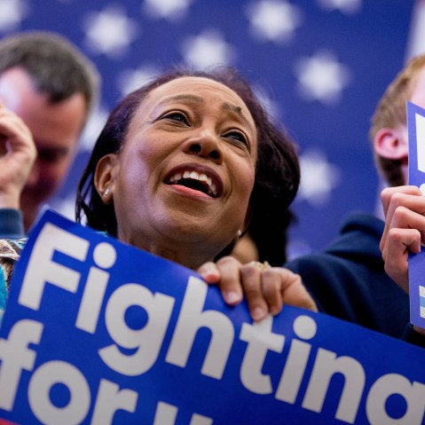 Supporters cheer as Democratic presidential candidate Hillary Clinton speaks at a get out the vote event at Transylvania University in Lexington, Ky., May 16, 2016. (Photo by Andrew Harnik/AP)