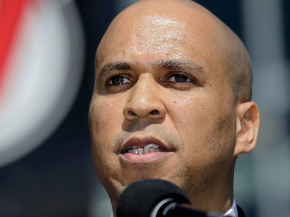 File Photo: Newark Mayor Cory Booker talks during a news conference outside of the Prudential Center, Wednesday, April 4, 2012, in Newark, N.J., (Photo by Julio Cortez/AP Photo File)