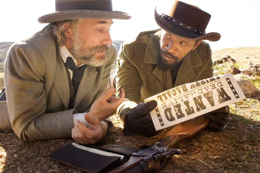 This undated publicity image released by The Weinstein Company shows, Christoph Waltz as Schultz, left, and Jamie Foxx as Django in the film, "Django Unchained," directed by Quentin Tarantino. Foxx says Hollywood should take some responsibility for...