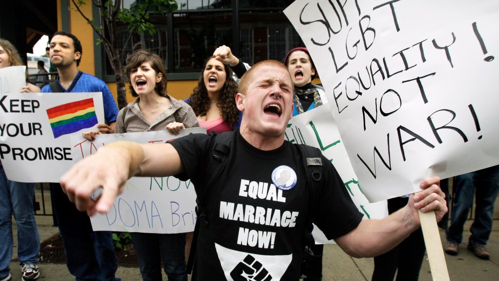 File Photo: Keegan O'Brien of Worcester, Mass., leads chants as members of the LGBT (lesbian, gay, bisexual, transgender) community protest the Defense of Marriage Act outside a Democratic National Committee fundraiser at which Vice President Joe Biden...