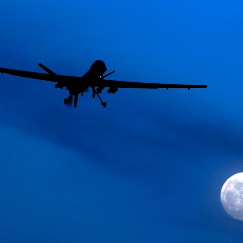 In this Jan. 31, 2010 file photo, an unmanned U.S. Predator drone flies over Kandahar Air Field, southern Afghanistan, on a moon-lit night. (Photo: AP Photo/Kirsty Wigglesworth)