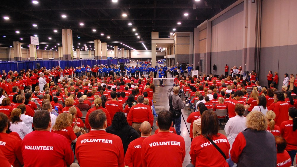 Volunteers wait for instructions at one of the National Association of Free and Charitable Clinics events