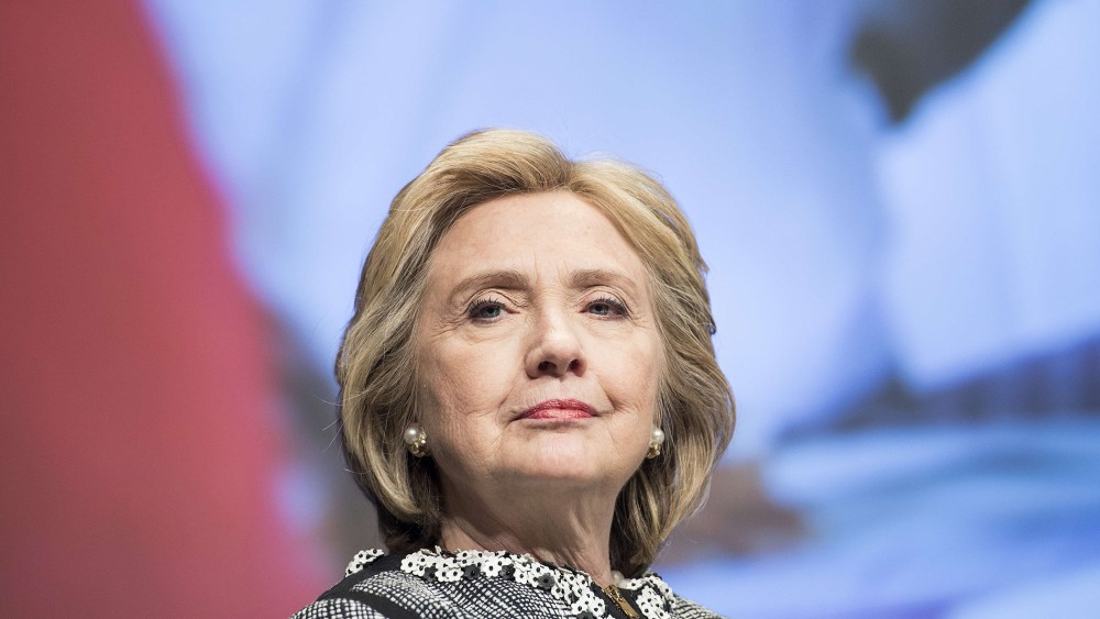 Hillary Clinton waits to speak at the World Bank in Washington, DC, May 14, 2014.