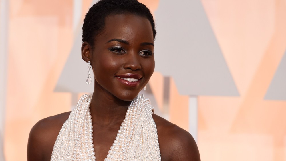 Actress Lupita Nyong'o arrives on the red carpet for the 87th Oscars Feb. 22, 2015 in Hollywood, Calif.