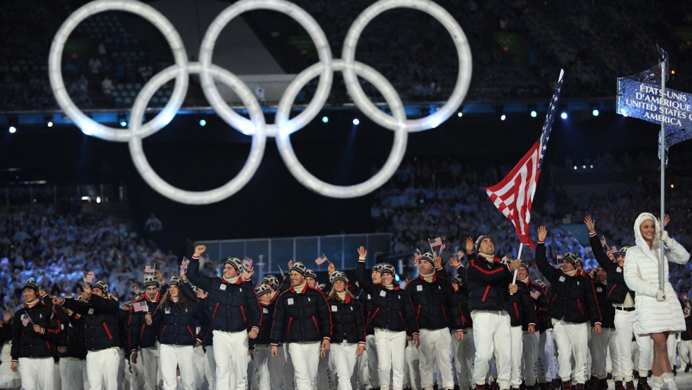 Athletes and members of the US delegation, including flagbearer and luger Mark Grimmette attend the opening ceremony for the Vancouver Winter Olympics at BC place in Vancouver on February 12, 2010.