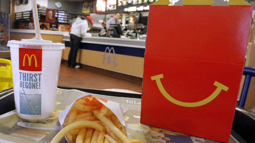 In this Jan. 20, 2012 photo, a Happy Meal box with French fries and a drink are posed at McDonald's in Springfield, Ill. (AP Photo/Seth Perlman)