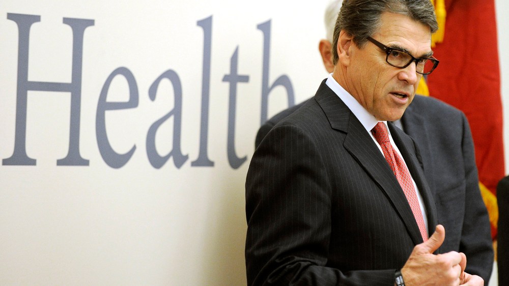 Texas Gov. Rick Perry makes a point as he speaks during a visit to the Galveston National Lab on Oct. 7, 2014, in Galveston, Texas.
