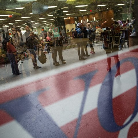 Hundreds of voters wait in line to cast their ballots on Nov. 4, 2014 in Austin, Texas. (Tamir Kalifa/AP)
