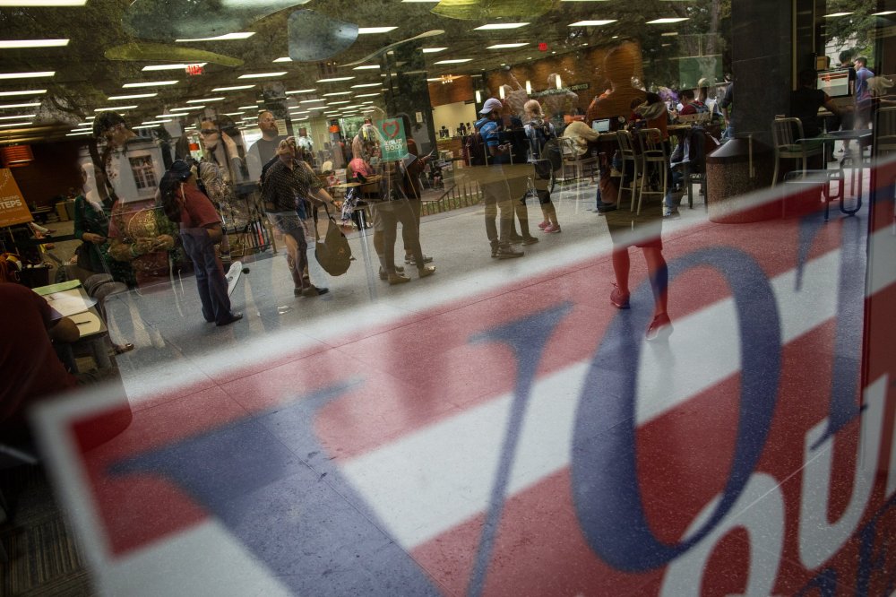 Hundreds of voters wait in line to cast their ballots on Nov. 4, 2014 in Austin, Texas. (Tamir Kalifa/AP)