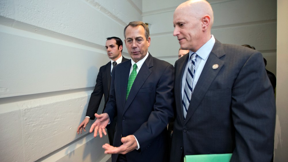 Speaker of the House John Boehner and House Ways and Means Committee Chairman Dave Camp at the Capitol in Washington, D.C., January 1, 2013.
