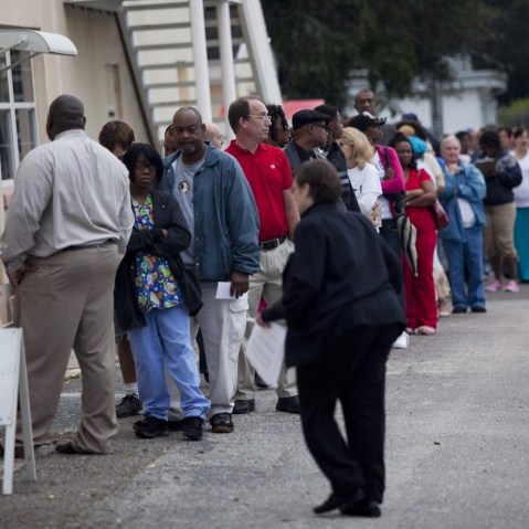 Lines of voters wait to cast their ballots as the polls open on Nov. 6 in St. Petersburg, Florida. (Photo: Edward Linsmier/Getty Images)