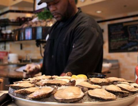 Rickey Lee shucks Louisiana oysters from area 7 at the Bourbon House restaurant on June 9, 2010 in New Orleans, Louisiana. Restaurants like the Bourbon House in the heart of the French Quarter are still serving fresh oysters daily. Due to the ongoing...