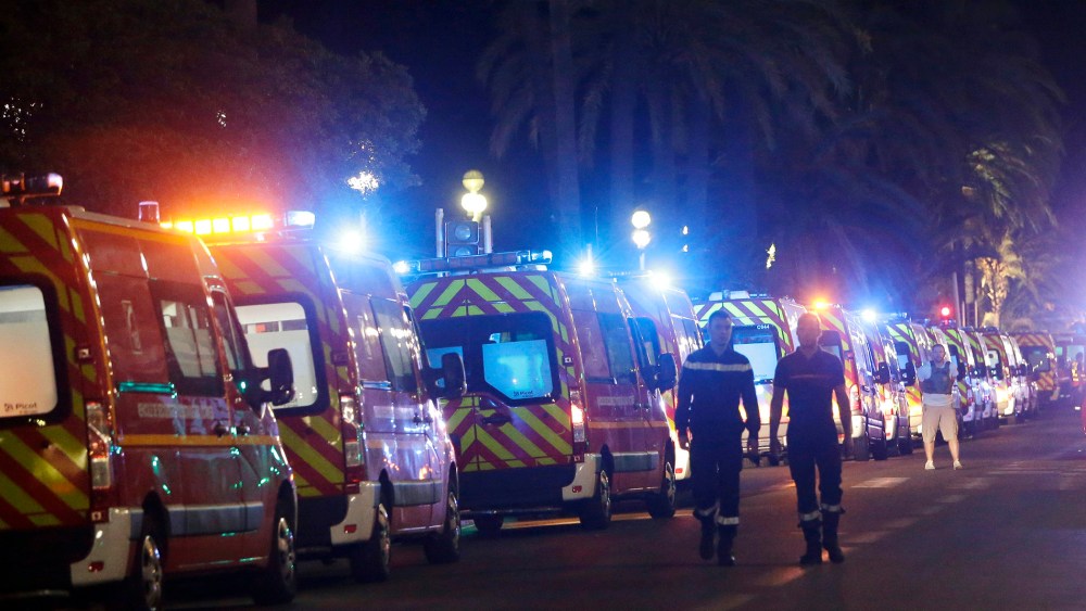 Ambulances line up near the scene of the attack in the French resort city of Nice, southern France, July 15, 2016. (Photo by Claude Paris/AP)