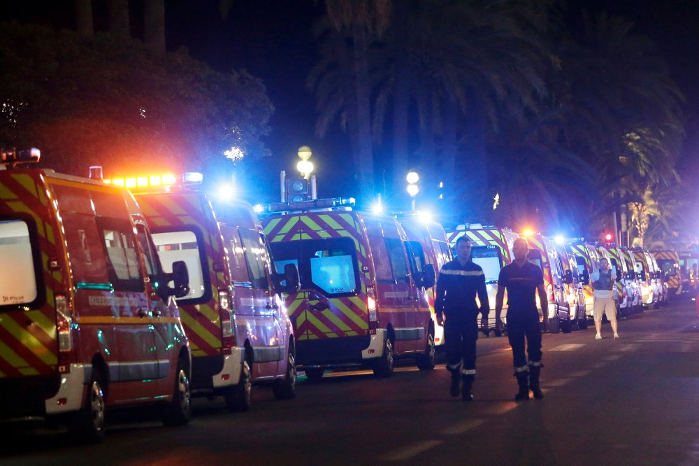 Ambulances line up near the scene of the attack in the French resort city of Nice, southern France, July 15, 2016. (Photo by Claude Paris/AP)