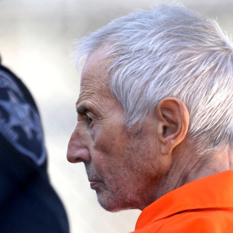 Robert Durst is escorted into Orleans Parish Prison after his arraignment in Orleans Parish Criminal District Court in New Orleans, on March 17, 2015.