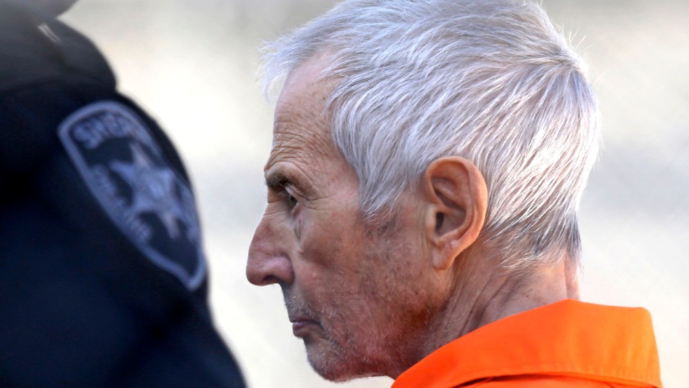 Robert Durst is escorted into Orleans Parish Prison after his arraignment in Orleans Parish Criminal District Court in New Orleans, on March 17, 2015.