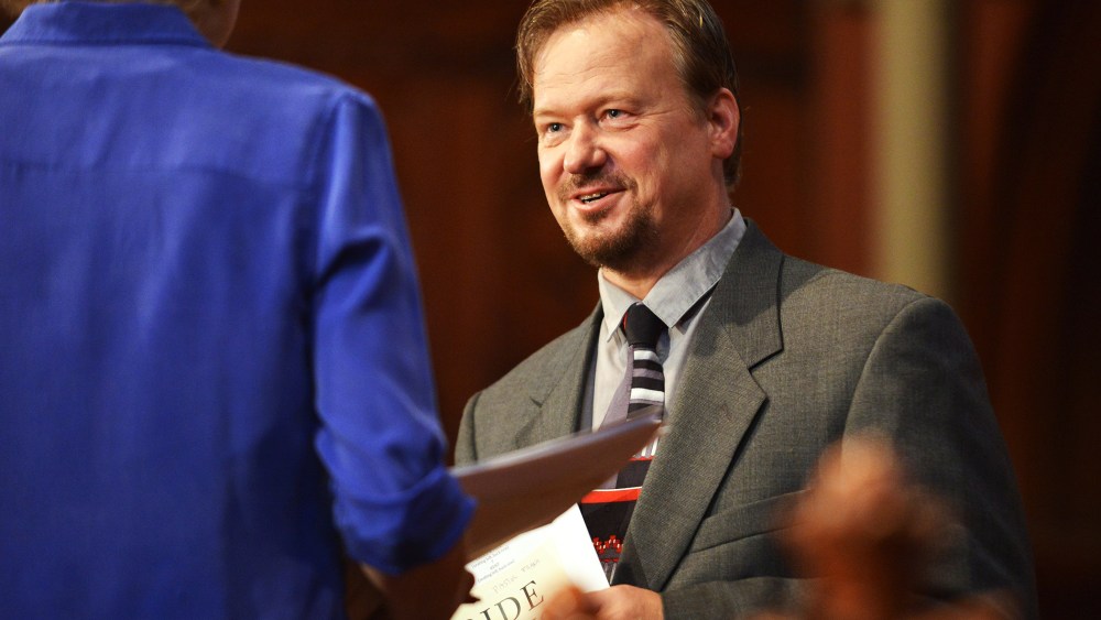 Frank Schaefer, right, speaks with Rev. Nancy Taylor, left, before a ceremony where Schaefer received an Open Door Award for his public advocacy, June 14, 2014.
