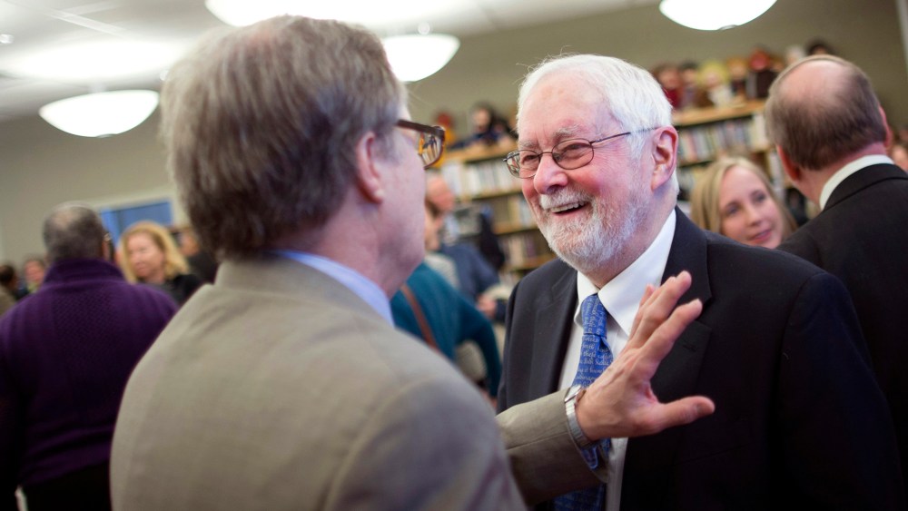The Rev. Thomas Ogletree smiles following an announcement that a case against him for officiating his son's same-sex marriage had been dropped, on March 10, 2014, in White Plains, N.Y.
